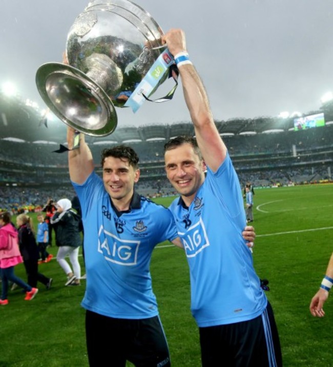 Bernard Brogan and Alan Brogan celebrate with the Sam Maguire trophy