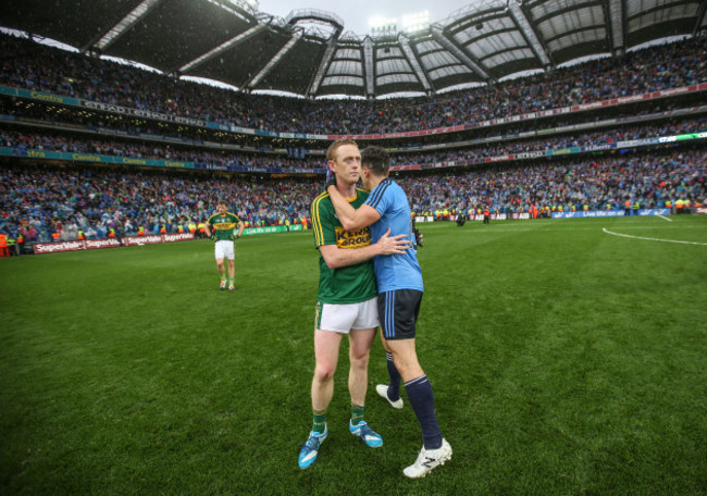 Bernard Brogan consoles Colm Cooper after the game