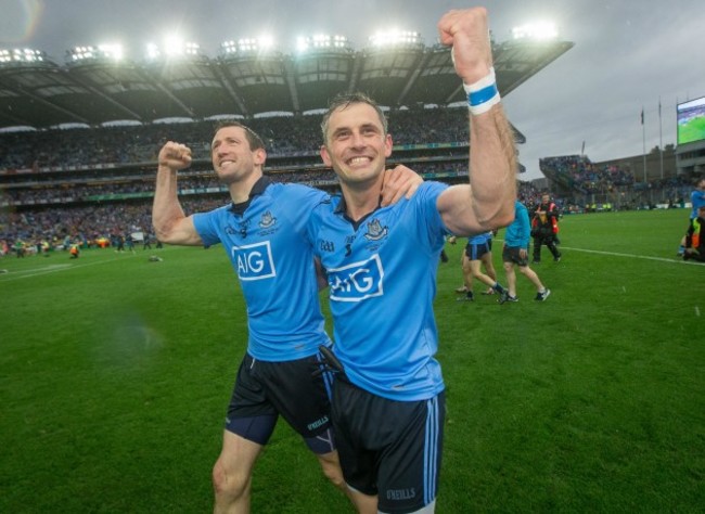 Denis Bastick and Alan Brogan celebrate