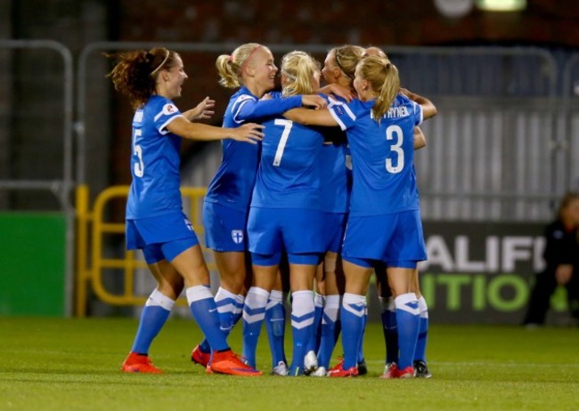 Finland players celebrate scoring