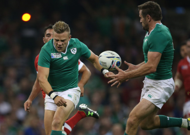 IrelandÕs  Ian Madigan passes to Jared Payne