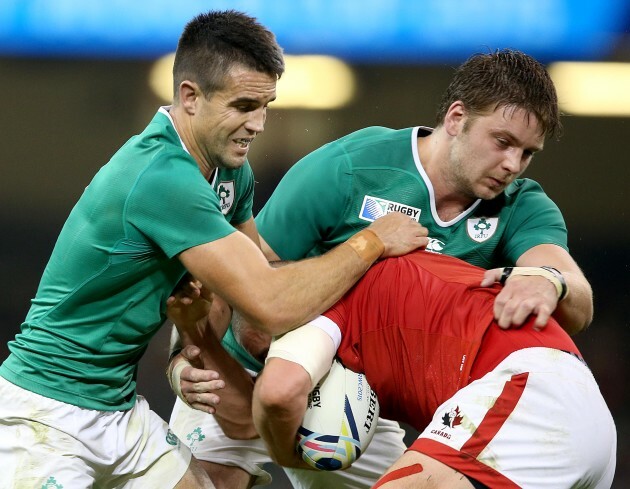 Conor Murray and Iain Henderson tackle Nick Blevins