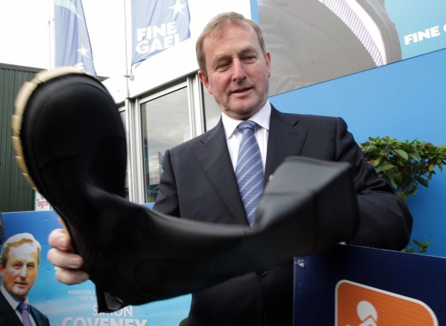 23/9/2015 Taoiseach Enda Kenny TD is pictured chec