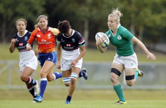 Claire Molloy runs in for a try