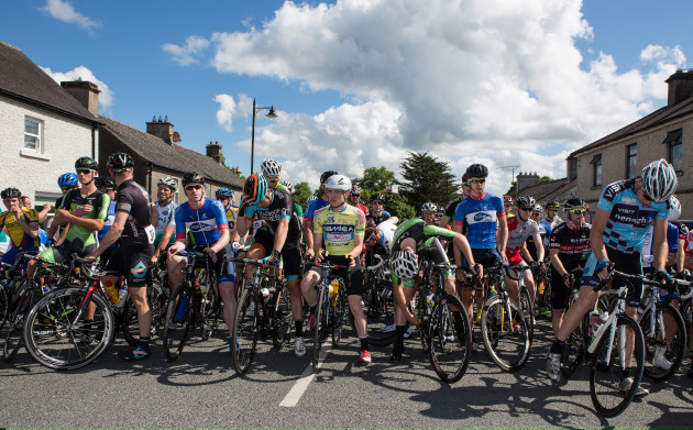 Riders await the start of the race