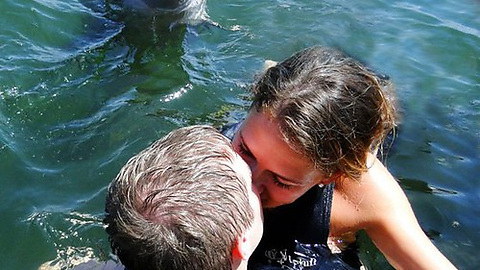 This dolphin just proposed and she has the cheek to go and kiss another guy...