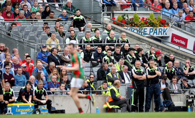 Noel Connelly and Pat Holmes look on