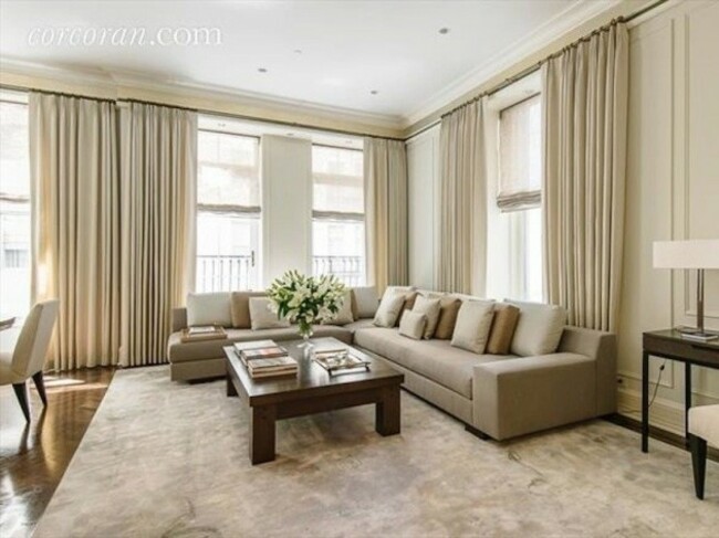 the-living-room-is-spacious-and-has-large-bright-windows