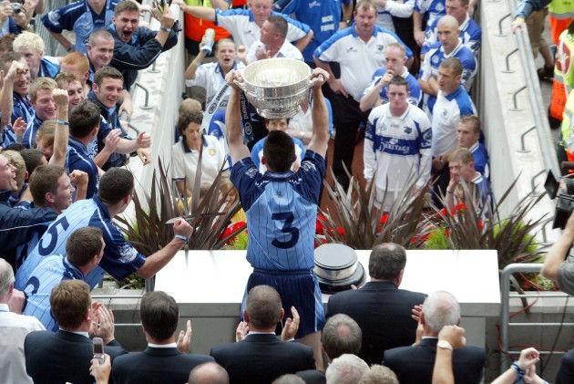 Dublin captain Paddy Christie lifts the Leinster trophy