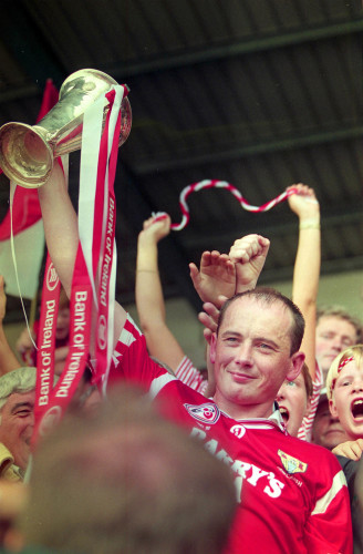 Niall Cahalane lifts the trophy 1995