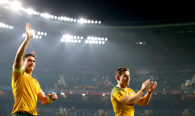 Rob Simmons and Bernard Foley celebrate