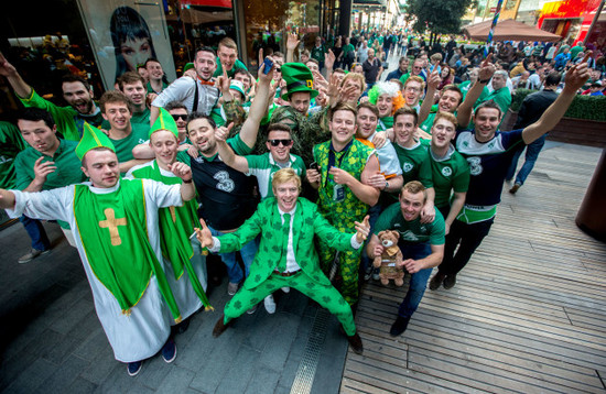 Ireland fans make there way through the Westfield Shopping Centre outside the Olympic Stadium