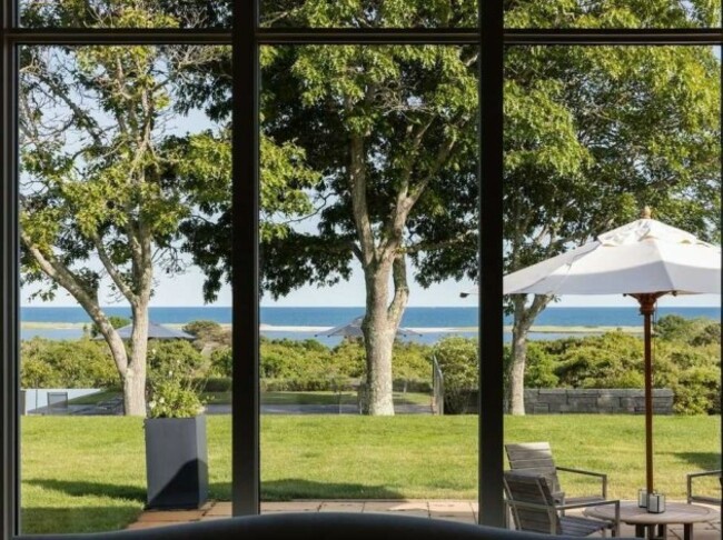 sitting-on-over-nine-acres-of-land-at-120-feet-above-the-atlantic-the-home-affords-bountiful-ocean-views-of-the-south-shore-and-chilmark-pond