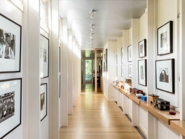 long-hallways-are-perfect-for-an-extensive-art-collection-or-family-photos