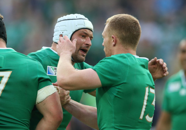 Keith Earls celebrates scoring their first try with Rory Best