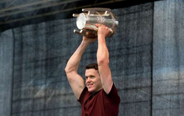 TJ Reid displays the Liam McCarthy Cup to the crowd