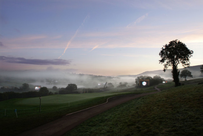 Early morning mist covers part of the course