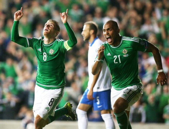 Steven Davis celebrates scoring their first goal with Josh Magennis