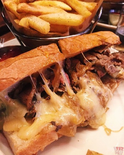 It's not #MeatlessMonday it's #MeatCrushMonday with this Steak Sandwich topped with Caramelized Onions, Spicy Aioli, and Gooey Cheese
