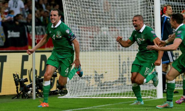 John Oohn O'Shea celebrates scoring the equalising goal