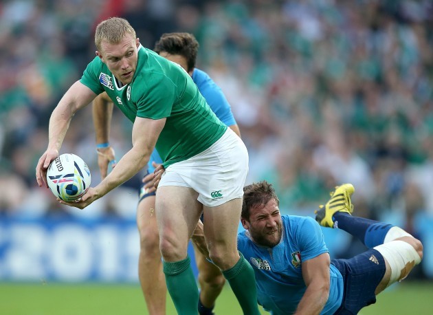 Keith Earls tackled by Michele Campagnaro