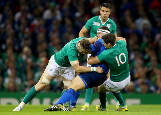 Jamie Heaslip and Johnny Sexton with Guilhem Guirado