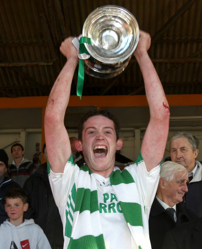 Martin Comerford lifts the trophy