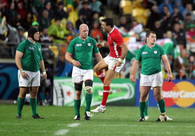 Mike Phillips celebrates around a dejected Paul O'Connell, Mike Ross and Cian Healy