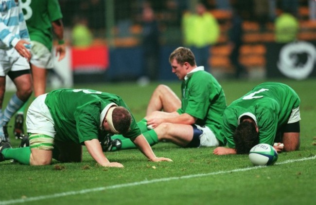 Ireland players dejected as the whistle blows