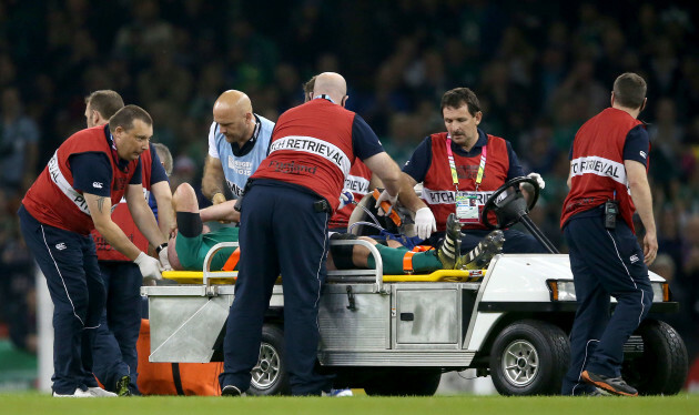 Paul O'Connell leaves the field injured at half-time