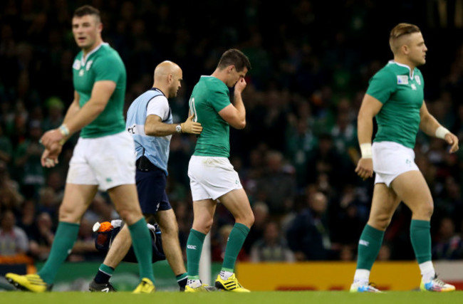 Johnny Sexton leaves the field injured with Dr Eanna Falvey