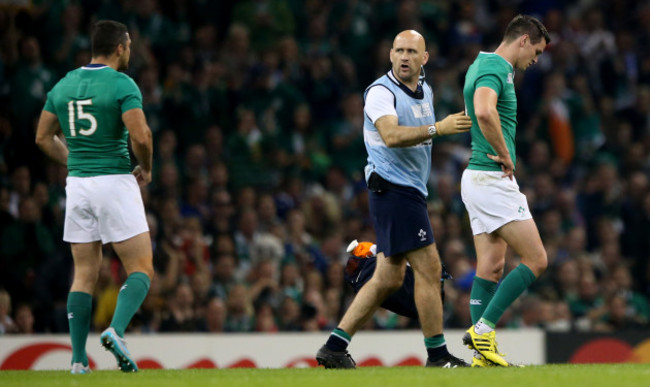 Johnny Sexton leaves the field injured with Dr Eanna Falvey