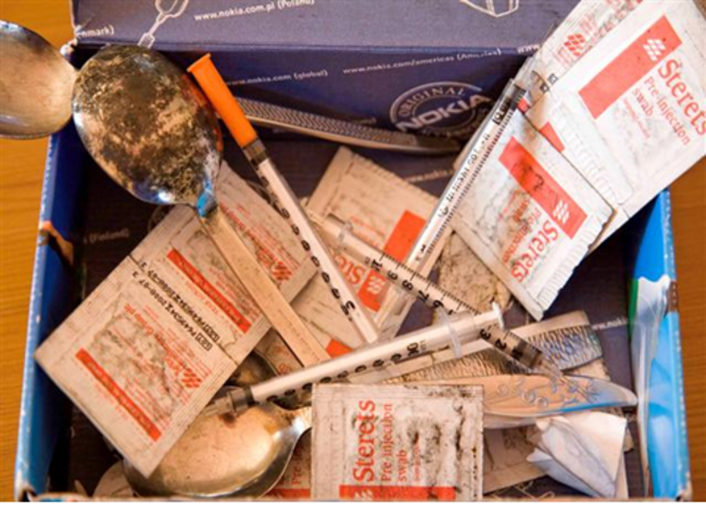 Box of Needles found next  to nicks body