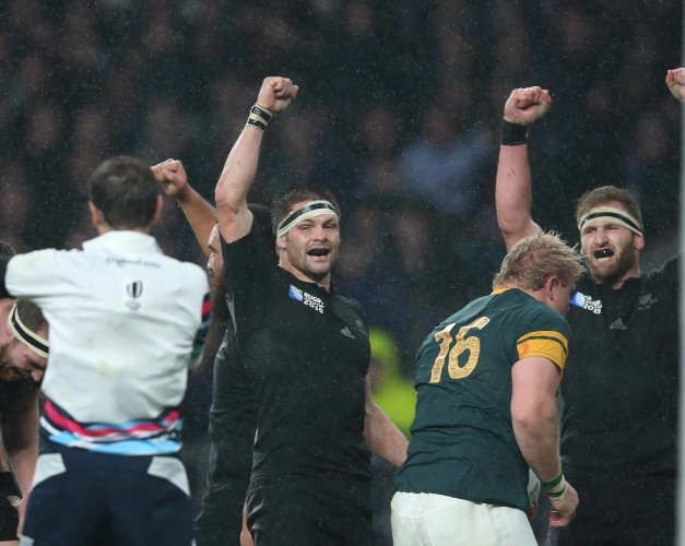Richie McCaw and Kieran Read celebrate at the end of the match