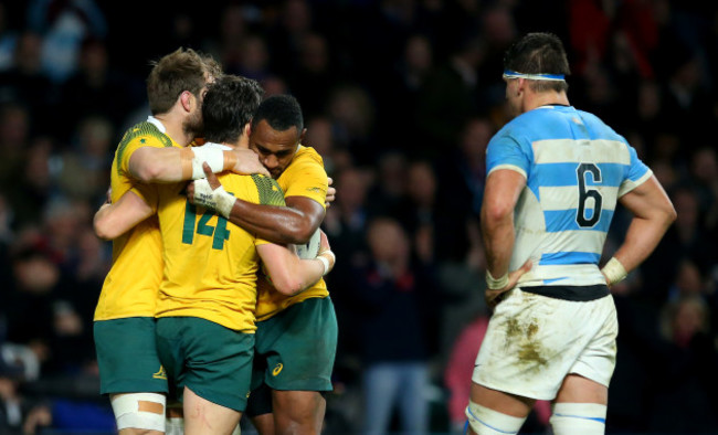 Sean McMahon and Tevita Kuridrani celebrate with Adam Ashley-Cooper after he scored his sides third try