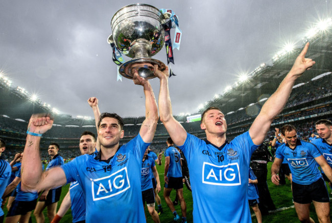 Bernard Brogan and Paul Flynn celebrates with the trophy