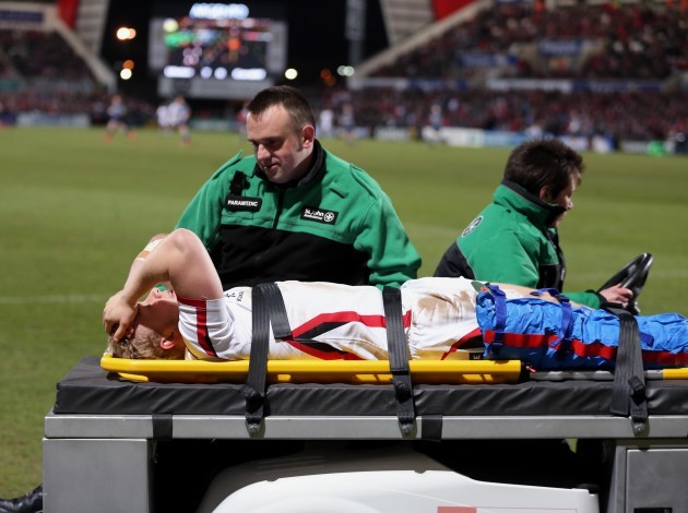 Stuart Olding is stretched off by medics