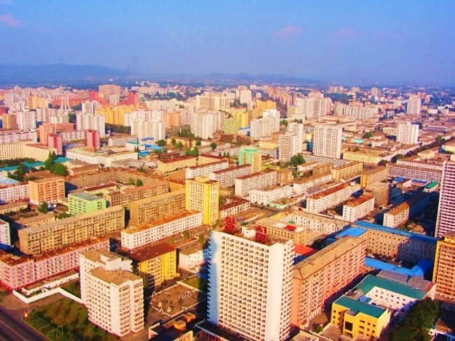 this-shot-of-the-capital-city-of-pyongyang-was-taken-in-flight-upon-landing-their-cameras-and-phones-were-searched-for-gps-capability-and-their-passports-were-seized-until-their-departure-the-scariest-part-of