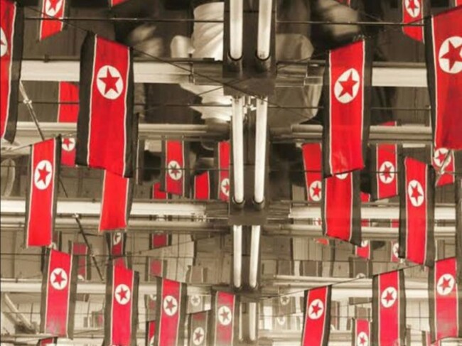 even-the-bowling-alley-was-filled-with-flags-propaganda-infused-almost-every-element-of-life-there-they-said