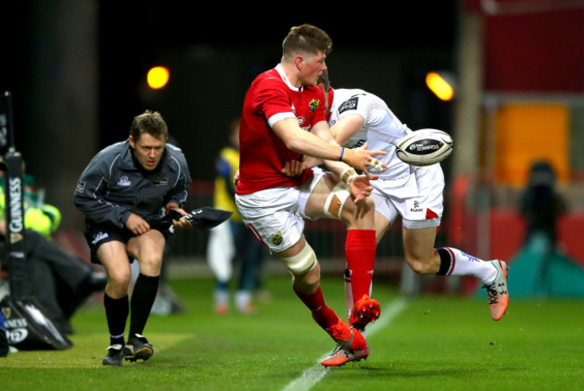 Jack O'Donoghue tackled by Andrew Trimble