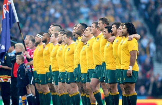The Australia team stand for the National Anthem