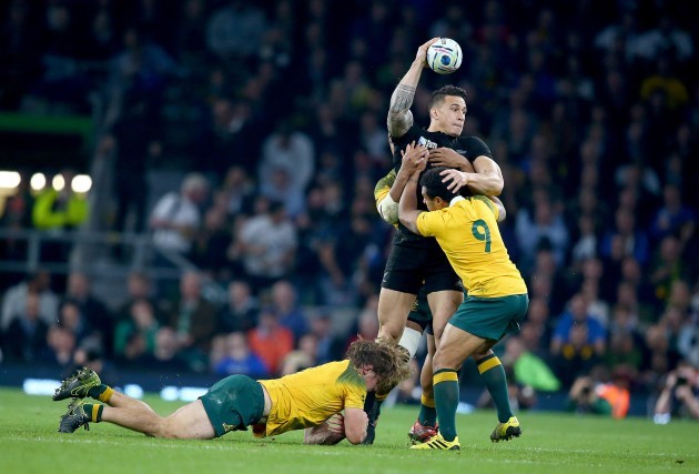 Sonny Bill Williams tackled by Michael Hooper, Will Genia and Israel Folau as he offloads to Ma'a Nonu who runs in for a try