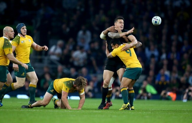 Sonny Bill Williams tackled by Michael Hooper, Will Genia and Israel Folau as he offloads to Ma'a Nonu who runs in for a try
