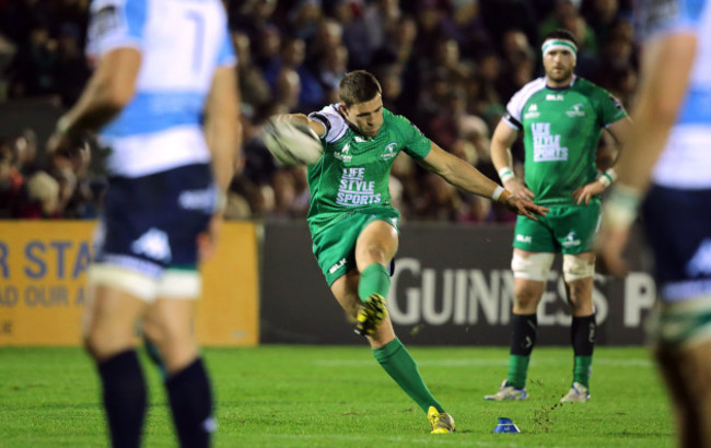 Craig Ronaldson kicks a penalty