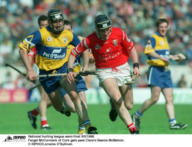 Fergal McCormack of Cork gets past Clare's Seanie McMahon