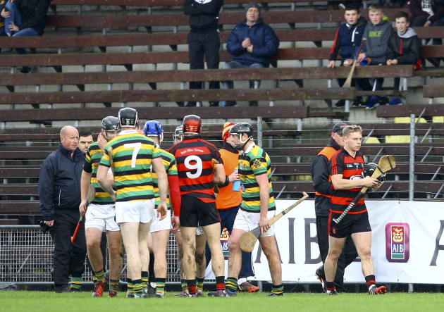 Philip Mahony walks off the pitch after being sent off