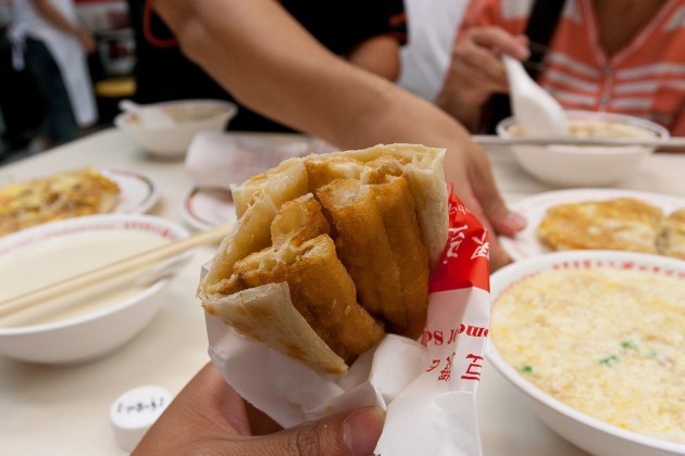 china-traditional-breakfasts-vary-by-region-but-the-combination-of-fried-dough-sticks-or-you-tiao-and-warm-soy-milk-is-beloved-by-millions-dim-sum-and-hot-soups-like-congee-are-also-popular