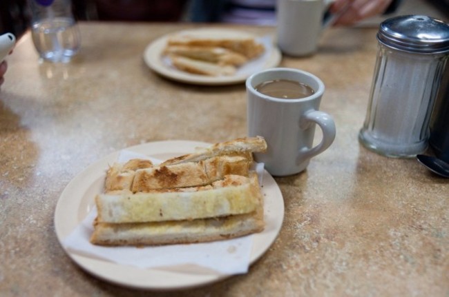 cuba-the-typical-breakfast-tostada-grilled-buttered-bread-is-served-alongside-or-dunked-into-cafe-con-leche