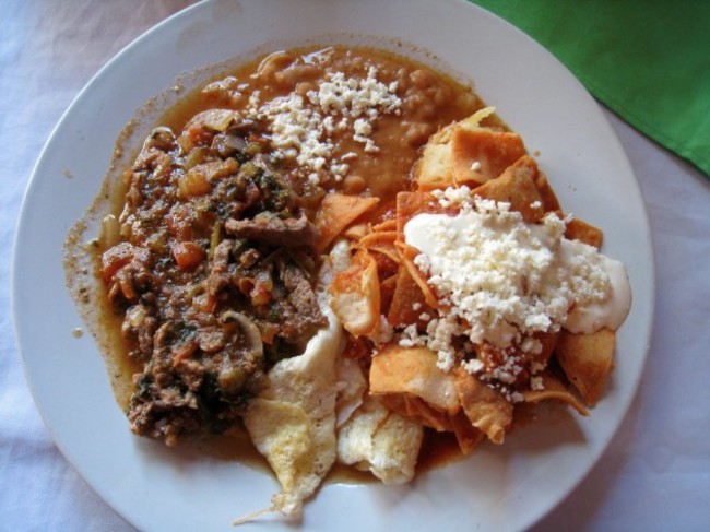 mexico-the-first-meal-of-the-day-is-hearty-with-dishes-like-chilaquiles-below-and-huevos-rancheros-being-popular-choices-sweet-rolls-and-coffee-are-lighter-options