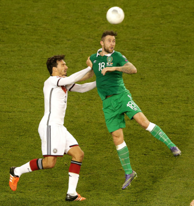 Daryl Murphy with Mats Hummels